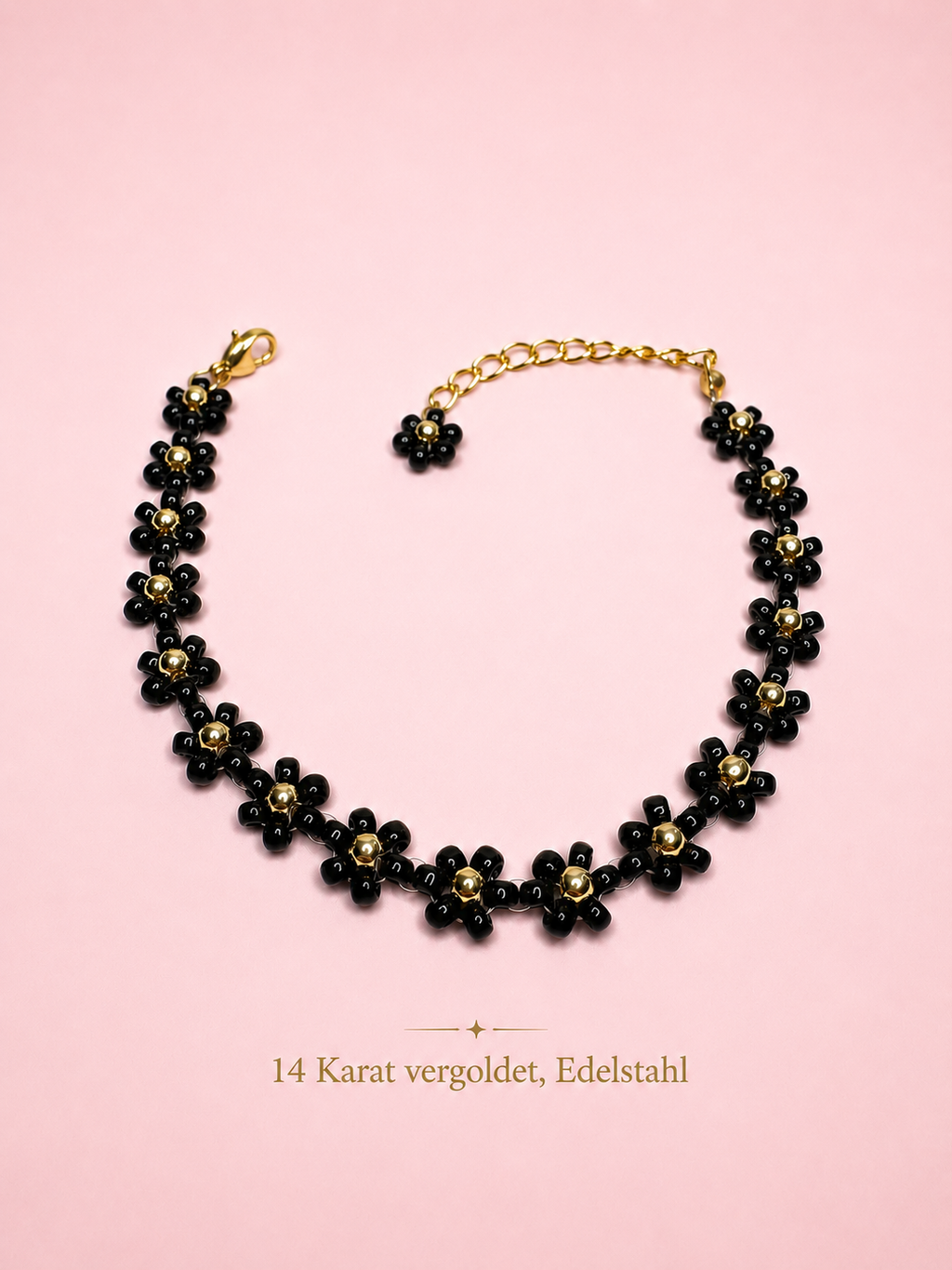 Blumenarmband Schwarz-Gold