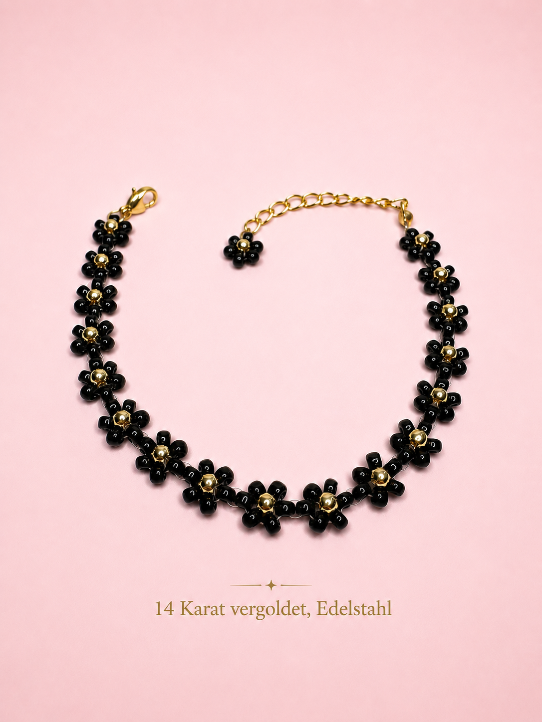 Blumenarmband Schwarz-Gold