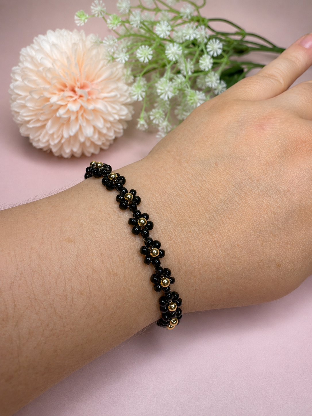 Blumenarmband Schwarz-Gold